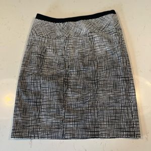 Black and white express prencil skirt gently used in great shape.